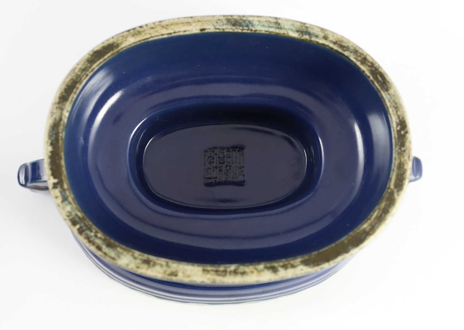 A Chinese Imperial blue glazed ritual offering vessel and cover, gui, moulded Qianlong seal mark and of the period (1736-95)